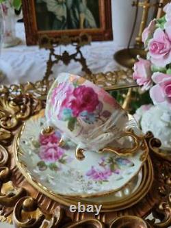 Antique Fine China Made in Japan Lovely Rose Pattern 3 feet Tea Cup and Saucer