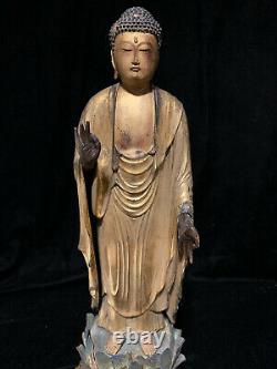 Fine classic Japanese wood gilt lacquer standing Buddha with lotus base 19th c