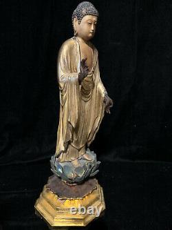 Fine classic Japanese wood gilt lacquer standing Buddha with lotus base 19th c