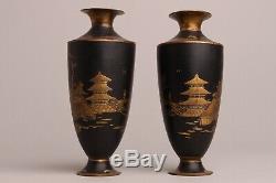 Fine pair of 19th century Japanese metal black and gold landcape vases, Fuiji