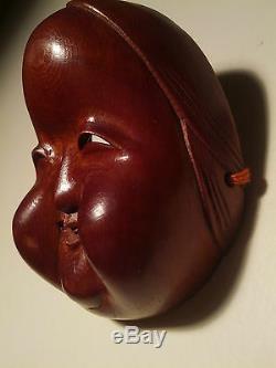 Ichii-itto-bori, Fine, Japanese Decorative Netsuke Mask (Mennetsuke) Okame